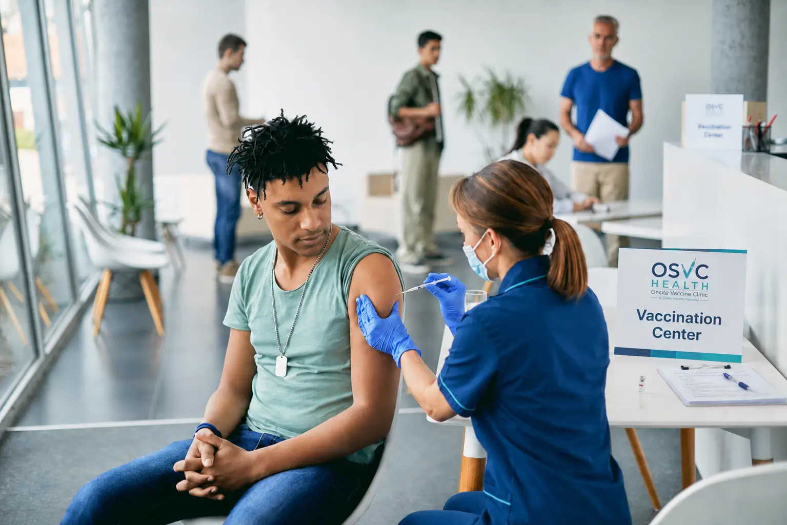 person receiving vaccine at clinic